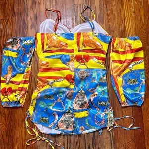 This is a cute romper with drawstrings on the sides & zipper back